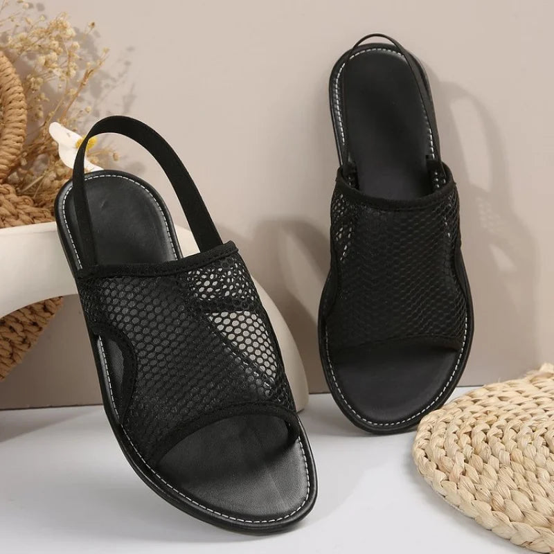 Women's stylish and breathable black mesh open - toe flat sandals. Versatile and comfortable.
