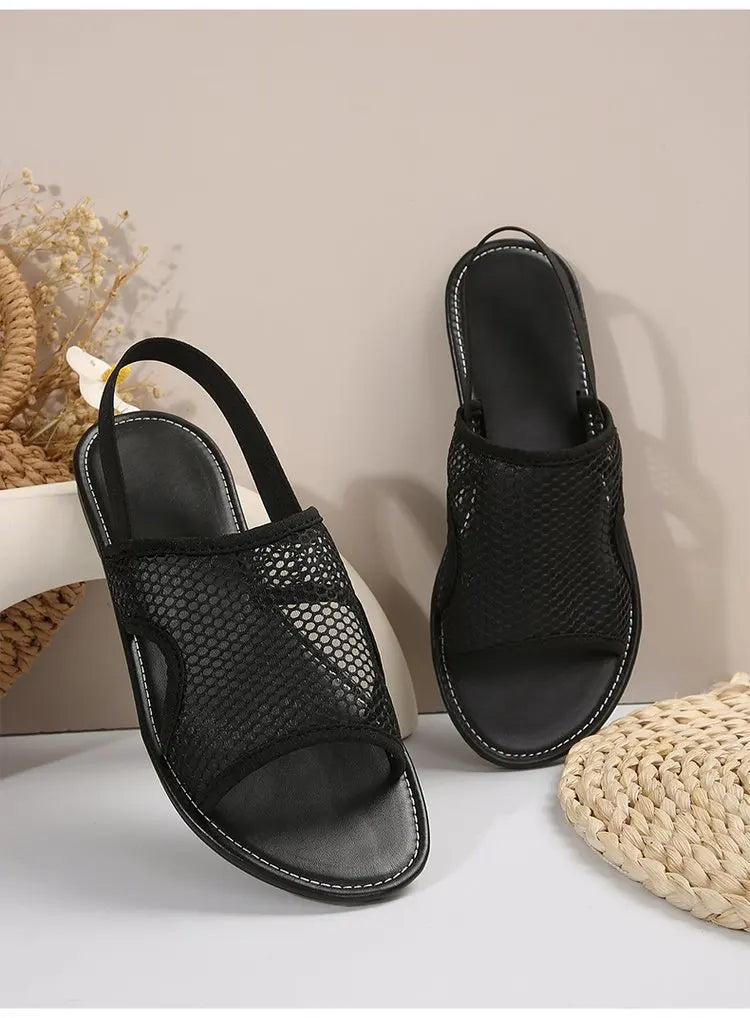 Women's stylish and breathable black mesh open - toe flat sandals. Versatile and comfortable.