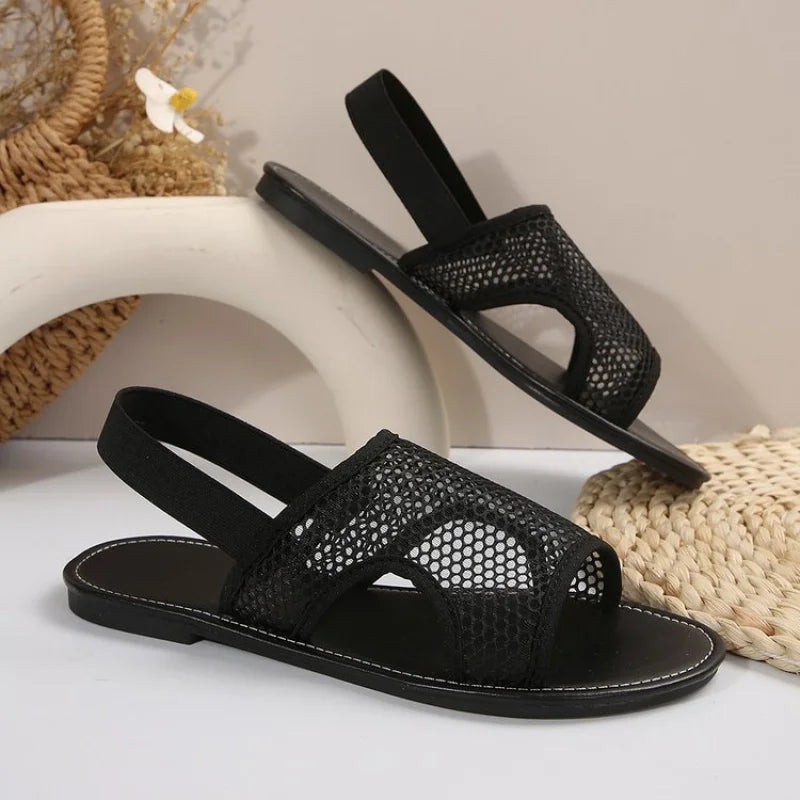 Women's stylish and breathable black mesh open - toe flat sandals. Versatile and comfortable.