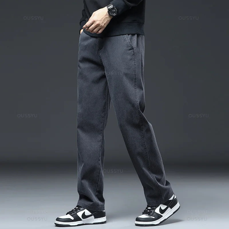 Spring Autumn New Upgraded Lyocell Fabric Jeans Men Loose Straight Elastic Waist Casual Denim Pants Trousers Male Large Size 5XL